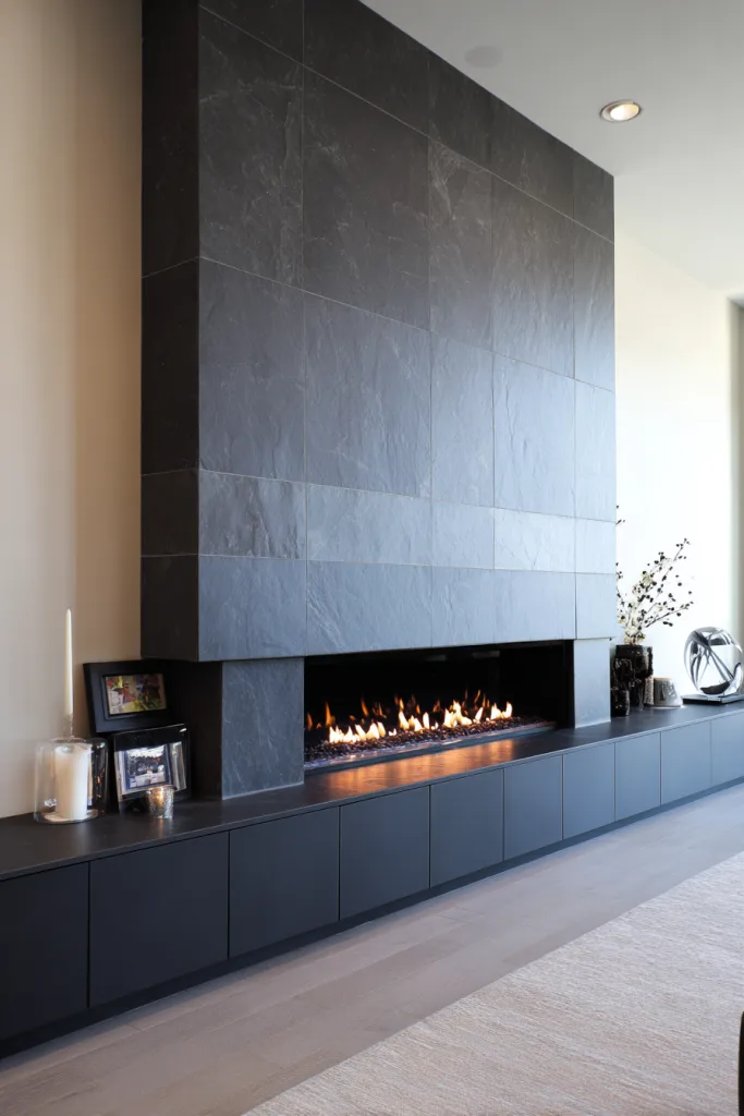 Fireplace accent wall extending floor to ceiling