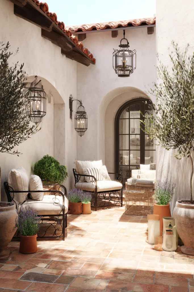 Mediterranean lanai with terracotta tile and wrought iron furniture