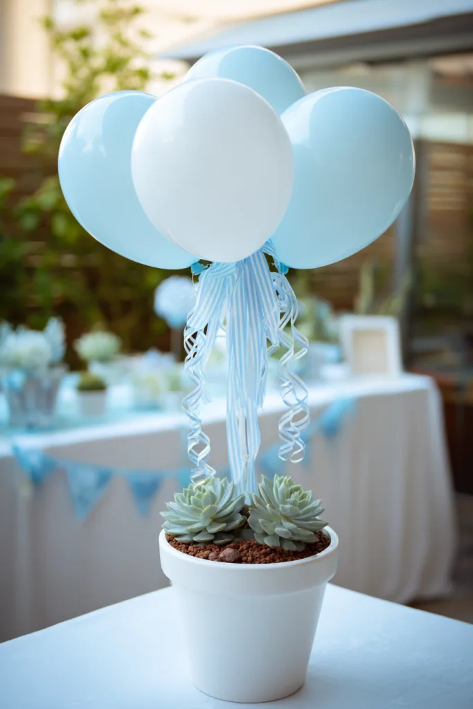 balloon garland centerpiece for a baby shower table
