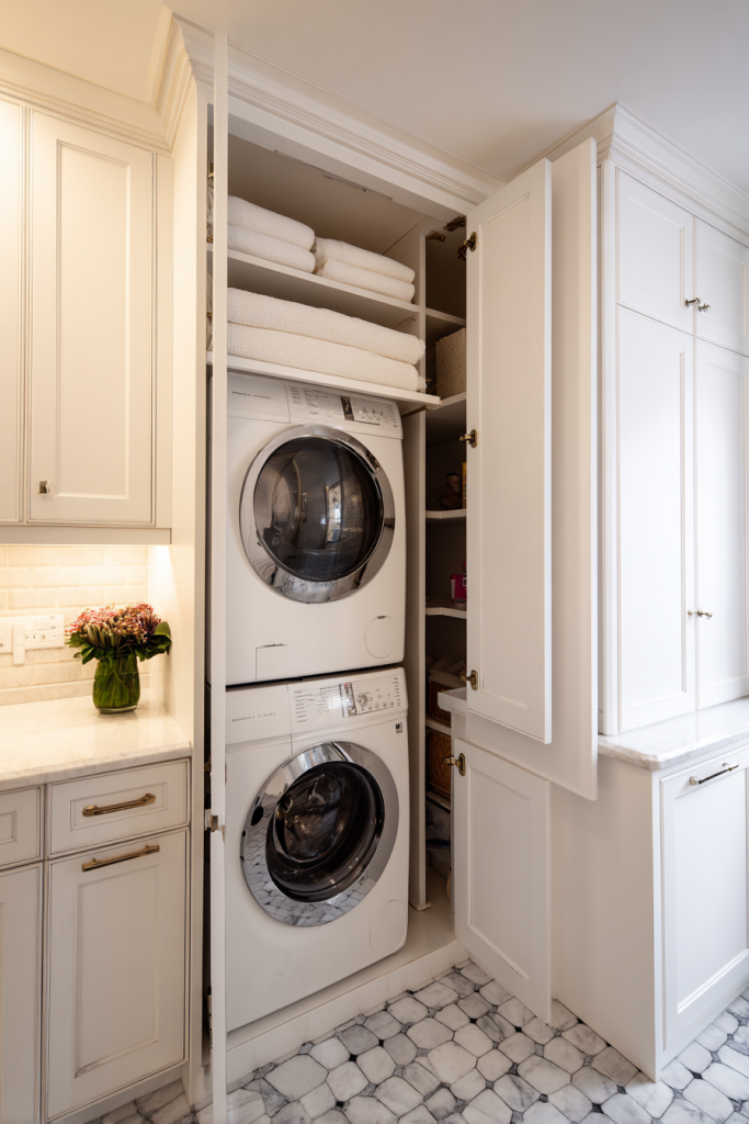 small bathroom with laundry