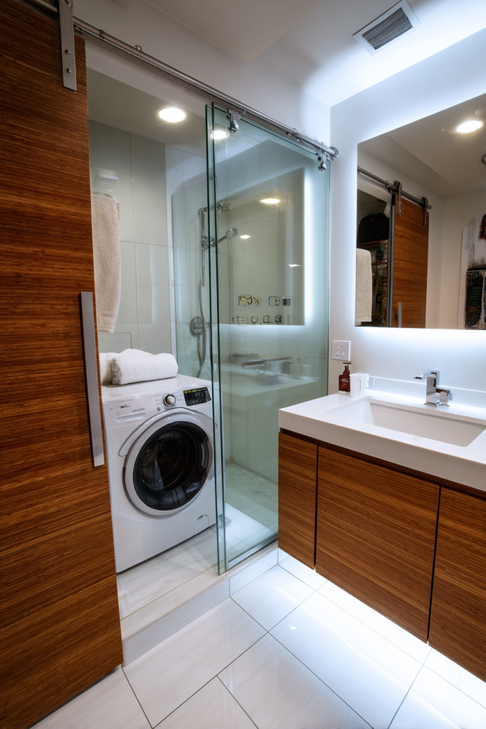 small bathroom with laundry